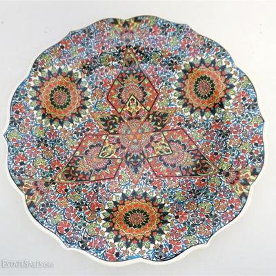 Lot 7 -  Turkish handmade and hand-painted ceramic Ottoman Iznik floral medallion pattern decorated plate. The verso marked