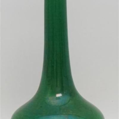 Lot 104 - Exceptional Chinese Jiaqing Period ca. 1810-1820 Porcelain Bottle Vase with a monochromatic apple green glaze, raised on a...