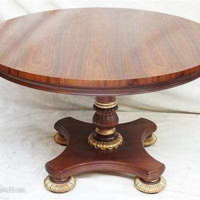 Lot 140 - Councill Craftsmen Mahogany Round Pedestal Library Table. Brass makers label on bottom of the table top. Measures 48