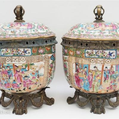 Lot 92 - A matched Pair of good quality Mid 20th c. Rose Mandarin Bronzed Metal Mounted Lidded Jars. Oval with lobed sides, polychrome...