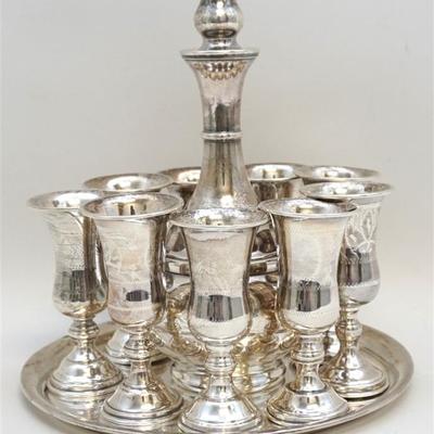 Lot 111- Complete Antique Solid Sterling Silver Etched Judaica Kiddush Set, New York, c. 1910. Consisting of a tray, which is 9” wide,...