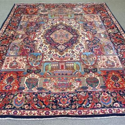 Lot 132 - Large Antique Isfahan Room Sized Rug Late 19th c. The ivory field with a central polychrome pendant medallion of urns and vases...