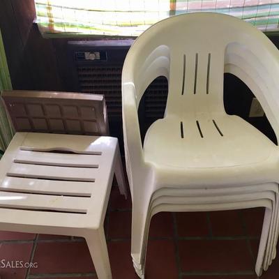 Plastic outdoor chairs and tables