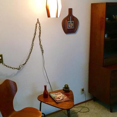 Scandinavian wood table and chair with Mid Century Modern lighting fixture 