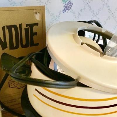 Sharp microwave and vintage kitchen items/home decor, including servingware, utensils, fondue set, crock pot, glasses, and more 