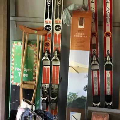 Skis, outdoor umbrella and holiday decor 
