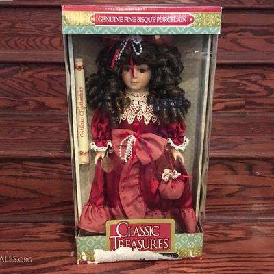 Classic Treasures doll. Genuine File Bisque Porcelain. Never been removed from box and comes with a Certificate of Authenticity, however,...