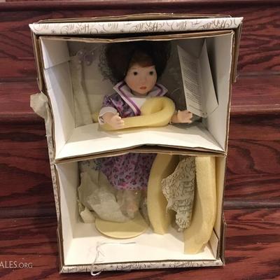 Franklin Heirloom Doll. Still in original packaging, along with packing foam and wrapping. Never been removed. Wrapping has received some...