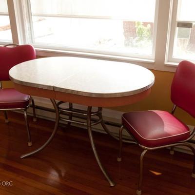 Mint condition '50s vintage table - has extra leaves. Reproduction chairs from Sozio. More chairs available. There's a second table like...