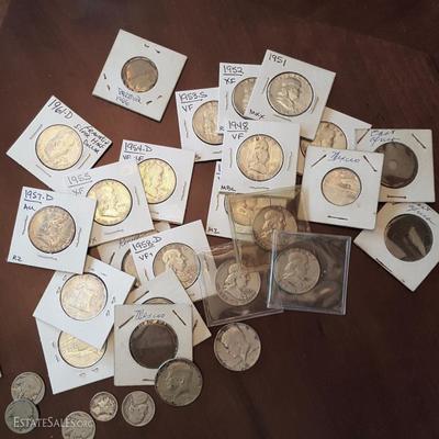 Silver coins, many packaged