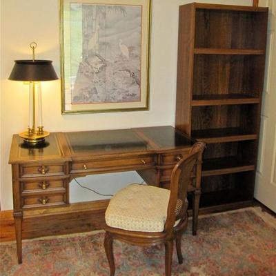 leather top desk, lamp, framed print, side chair, bookshelf