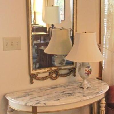 Country French style demi-lune console table with marble top, gold & white framed mirror, porcelain lamp