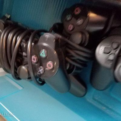 4 Play Station 2 Controllers
