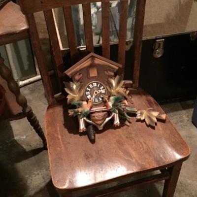 Chair and cuckoo clock.