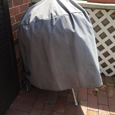 Weber Red charcoal grill with cover