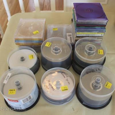 Box lot of burnable DVDs and a few music CDs
