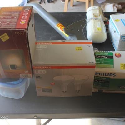 Box lot of light bulbs and wall sconce
