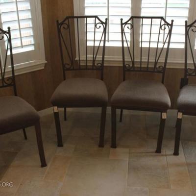 A set of four upholstered chairs like new
