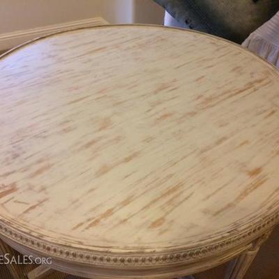 Whitewashed round table