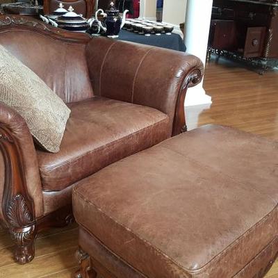 Leather sofa chair in brown with matching ottoman