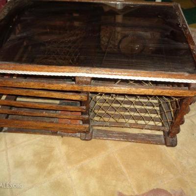 Old lobster trap made into coffee table