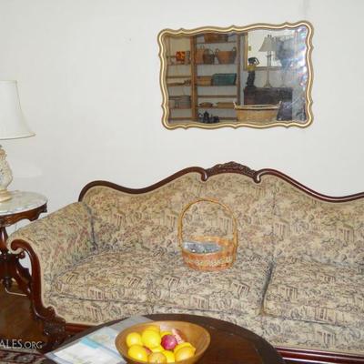 marble top table, lamp, sofa, framed mirror, etc.