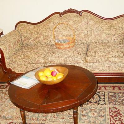 vintage sofa, coffee table, rug
