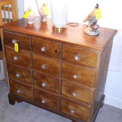 4 drawer chest, lamp w/shade, Haeger doves, pheasant, etc.