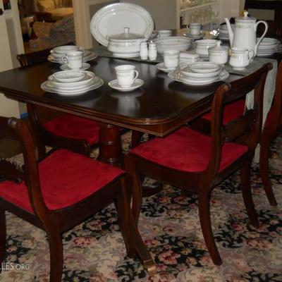 8 mahogany chairs, Duncan Phyfe dining room table w/1 pop-up leaf, Roseville China, etc/