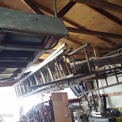 Lots of wood ladders; some aluminum