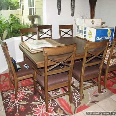 available as a pre-sale by appointment only all wood Dining Table with 8 chairs plus another extension.. measurements coming $600 great...