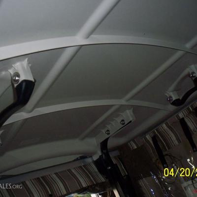 Also has hand grips on ceiling of golf cart