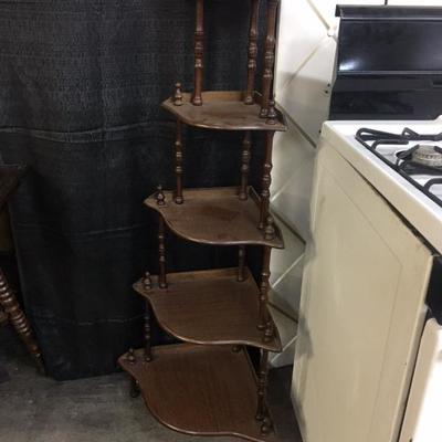 Tiered corner shelving
