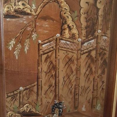 Detail on Asian theme armoire 