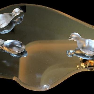 baccarat ducks on a pond shaped mirror