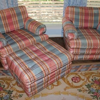 pair of Baker club chairs and one ottoman

