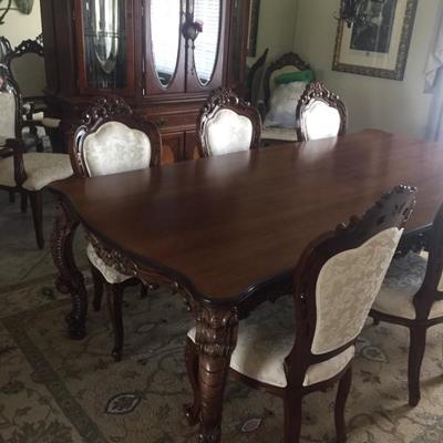Dinning table with chairs and matching China hutch 