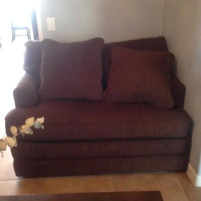 2 sofa beds. Dark brown, picture color is too red