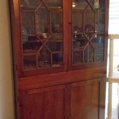 Antique mahogany corner cupboard $590