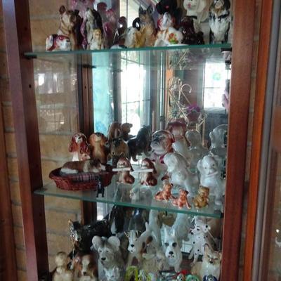 lots of dog figurines and statures 