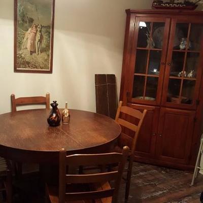 Circular oak table and corner cabinet