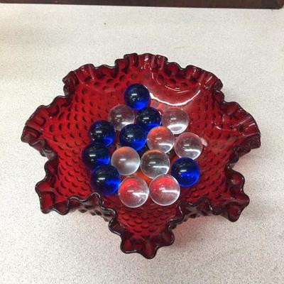 Ruby red bowl with glass balls
