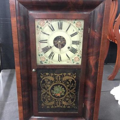 Old clock with weights