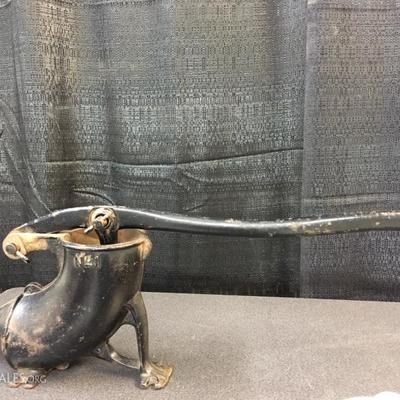 Antique cast iron sausage stuffer