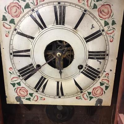 Old clock with weights