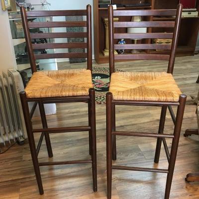 3 brown bar stools 