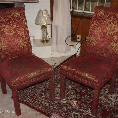 Pair of chairs with burgundy floral upholstery
