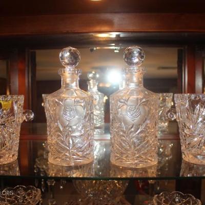 Lot of 4 crystal pieces:  pair of decanters and a pair of etched glass ice buckets

