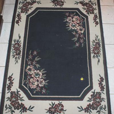 One floral machine made area rug
