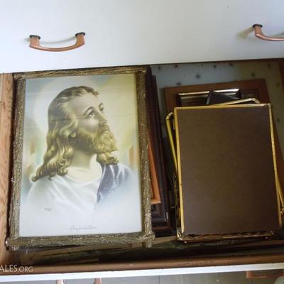 Large collection of vintage picture frames.